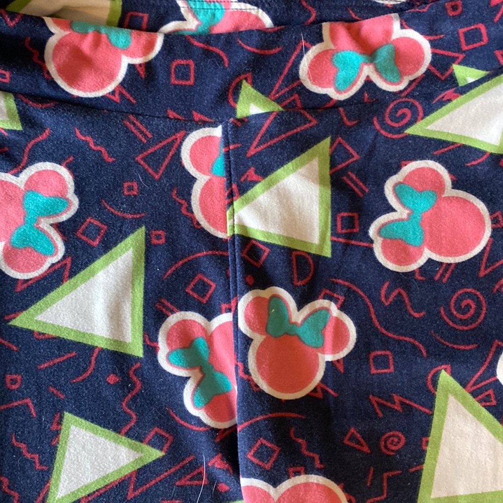 Lularoe leggings with Minnie head and triangles dark blue